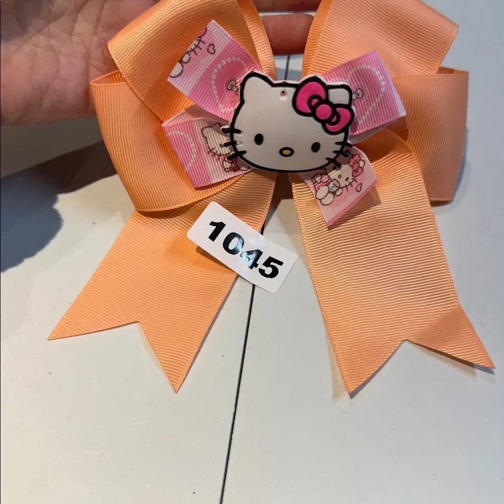 1045 Peach Color Hello Kitty Aligator Clip Hair Bow